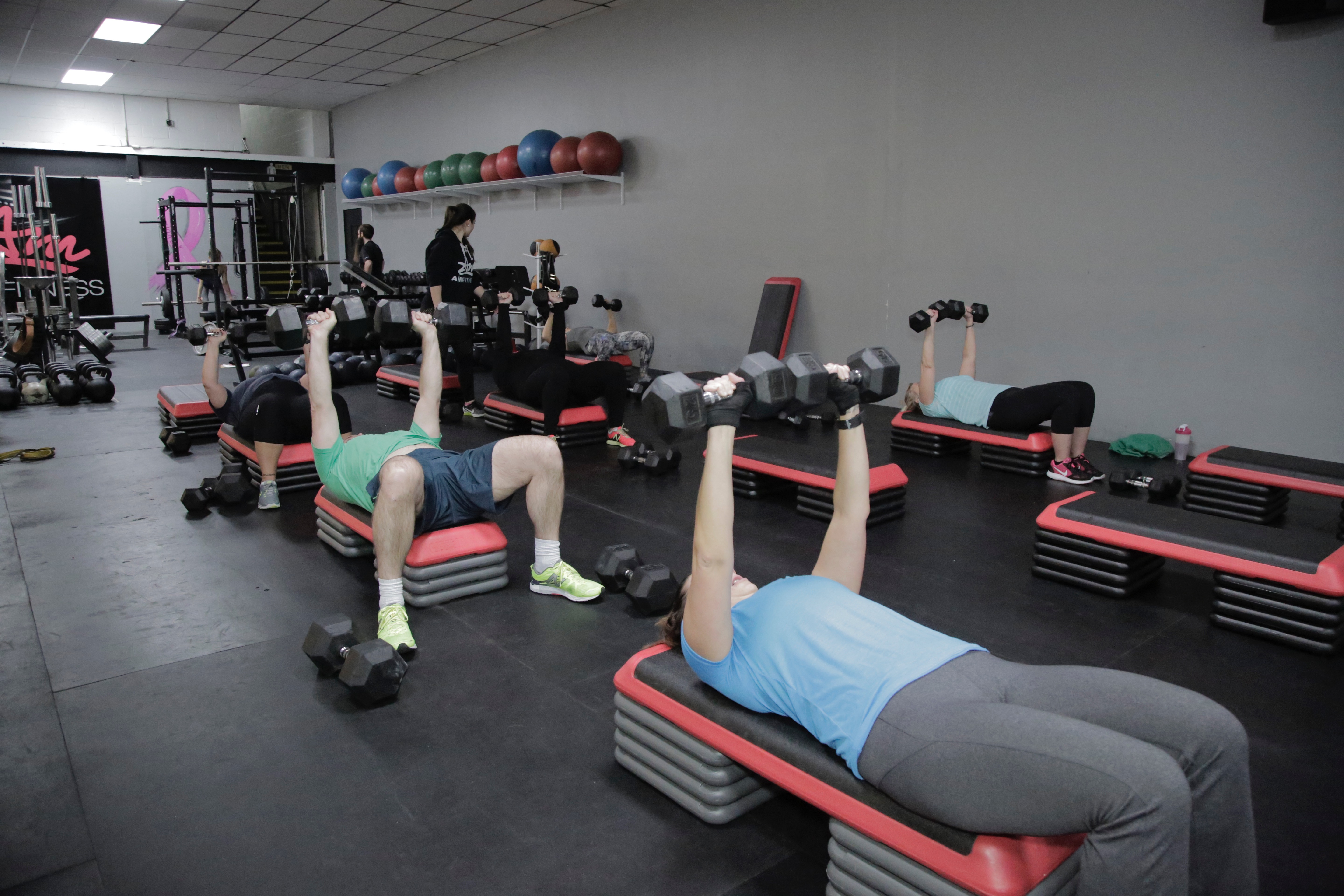 Large Group Training Class doing bench presses